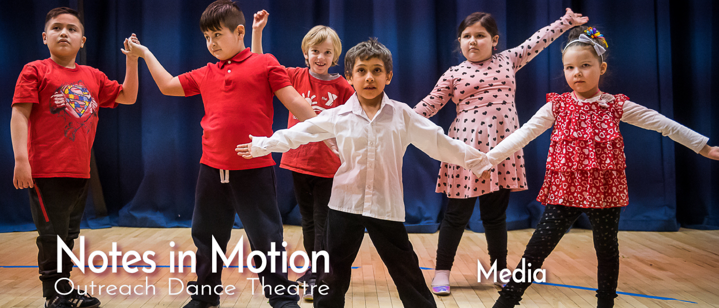Students striking a pose during their dance performance at PS 290, Queens